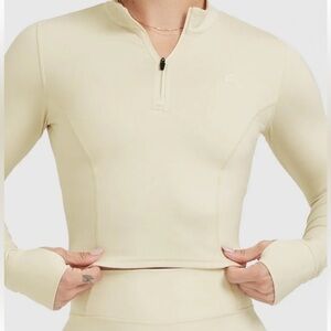 NWOT Oner Active TIMELESS HALF ZIP MID LONG SLEEVE TOP in Vanilla. Women’s L